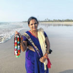 
			
				                                Seema Rajgarh, 37, hawks jewelry made of beads and stones on nearly deserted Utorda beach in South Goa, India,, Dec.16, 2020. On good days during the holiday season, the mother of three girls, the youngest not yet two years old, said she used to make 2,000 rupees ($27). Now, times are bleak. ‘Some days, I make barely 200 rupees ($2.7), not enough to even buy milk and food for my children,’ she said. ‘This virus has devastated our lives,’ Rajgarh said. Goans are mourning the loss of their livelihoods and possibly their way of life to the pandemic and travel restrictions.
 
			
		