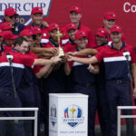 
			
				                                Team USA poses with the trophy at the closing ceremony after the Ryder Cup matches at the Whistling Straits Golf Course on Sunday in Sheboygan, Wis.
                                 AP photo

			
		